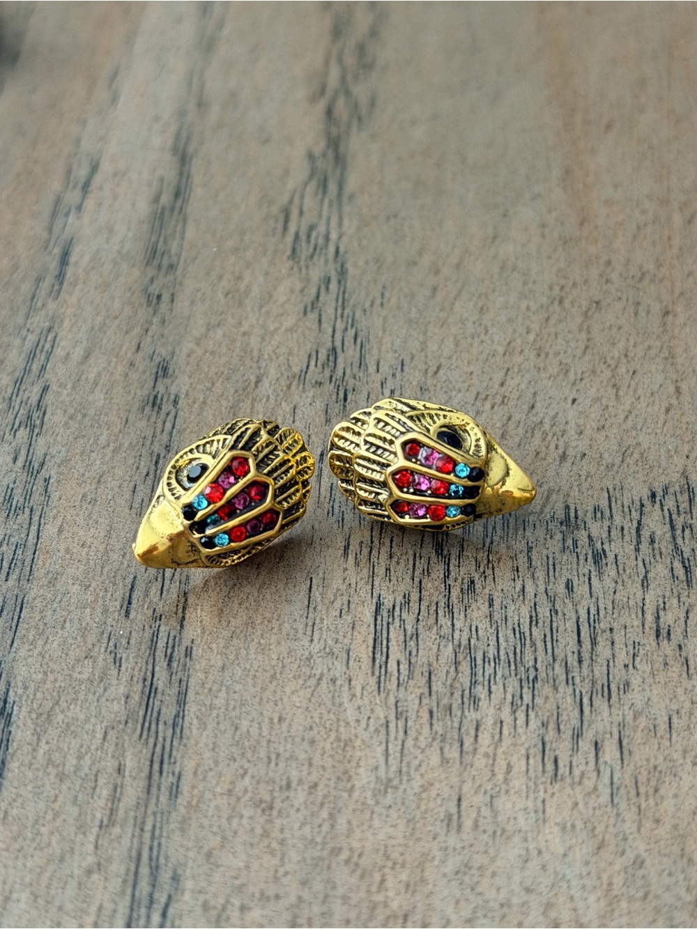 Kurt Geiger Gold-Tone Hand Motif Stud Earrings with Red and Blue Stones
